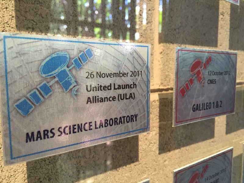 The badges denoting Sansa's involvement in the Galileo missions, as well as the Mars Science Laboratory.